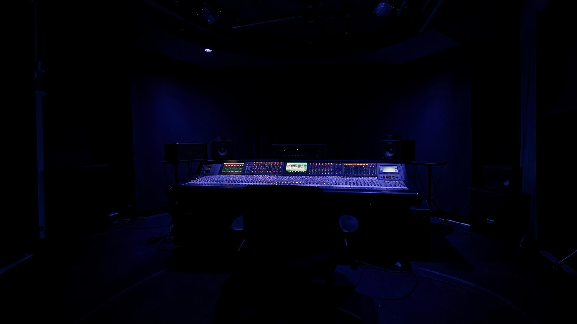 Chelsea E scoring soundstage at night